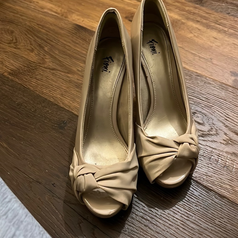Moderately worn great shoe decent condition.